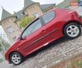 Красный Пежо 206, объемом двигателя 1.36 л и пробегом 230 тыс. км за 2200 $, фото 1 на Automoto.ua