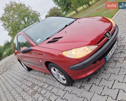 Красный Пежо 206, объемом двигателя 1.36 л и пробегом 230 тыс. км за 2200 $, фото 16 на Automoto.ua