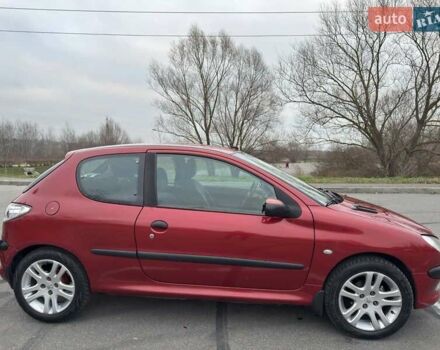 Красный Пежо 206, объемом двигателя 1.4 л и пробегом 179 тыс. км за 3600 $, фото 10 на Automoto.ua