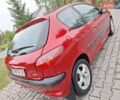 Красный Пежо 206, объемом двигателя 1.36 л и пробегом 230 тыс. км за 2200 $, фото 11 на Automoto.ua