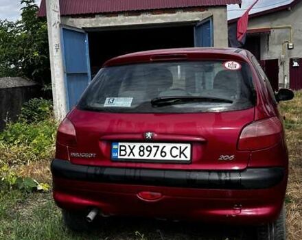 Красный Пежо 206, объемом двигателя 1.3 л и пробегом 228 тыс. км за 2300 $, фото 2 на Automoto.ua