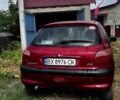 Красный Пежо 206, объемом двигателя 1.3 л и пробегом 228 тыс. км за 2300 $, фото 2 на Automoto.ua