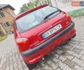 Красный Пежо 206, объемом двигателя 1.36 л и пробегом 230 тыс. км за 2200 $, фото 3 на Automoto.ua