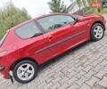 Красный Пежо 206, объемом двигателя 1.36 л и пробегом 230 тыс. км за 2200 $, фото 14 на Automoto.ua