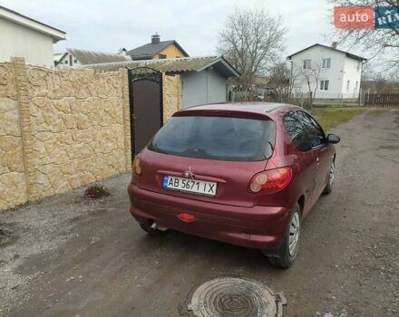 Красный Пежо 206, объемом двигателя 1.87 л и пробегом 315 тыс. км за 2700 $, фото 2 на Automoto.ua