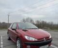 Красный Пежо 206, объемом двигателя 1.4 л и пробегом 179 тыс. км за 3600 $, фото 2 на Automoto.ua