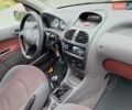 Красный Пежо 206, объемом двигателя 1.36 л и пробегом 230 тыс. км за 2200 $, фото 27 на Automoto.ua