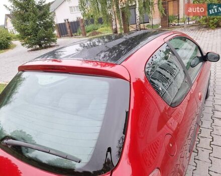 Красный Пежо 206, объемом двигателя 1.36 л и пробегом 230 тыс. км за 2200 $, фото 12 на Automoto.ua