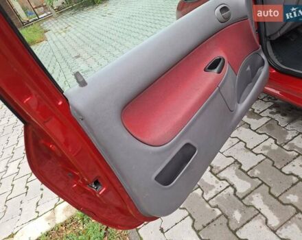 Красный Пежо 206, объемом двигателя 1.36 л и пробегом 230 тыс. км за 2200 $, фото 39 на Automoto.ua