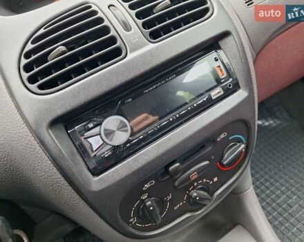 Красный Пежо 206, объемом двигателя 1.36 л и пробегом 230 тыс. км за 2200 $, фото 36 на Automoto.ua