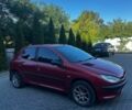 Червоний Пежо 206, об'ємом двигуна 1.36 л та пробігом 285 тис. км за 3200 $, фото 1 на Automoto.ua