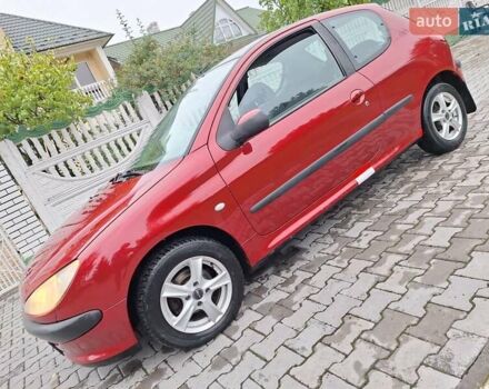 Красный Пежо 206, объемом двигателя 1.36 л и пробегом 230 тыс. км за 2200 $, фото 21 на Automoto.ua