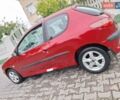 Красный Пежо 206, объемом двигателя 1.36 л и пробегом 230 тыс. км за 2200 $, фото 1 на Automoto.ua