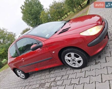 Красный Пежо 206, объемом двигателя 1.36 л и пробегом 230 тыс. км за 2200 $, фото 15 на Automoto.ua