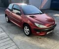 Красный Пежо 206, объемом двигателя 1.4 л и пробегом 163 тыс. км за 4000 $, фото 2 на Automoto.ua
