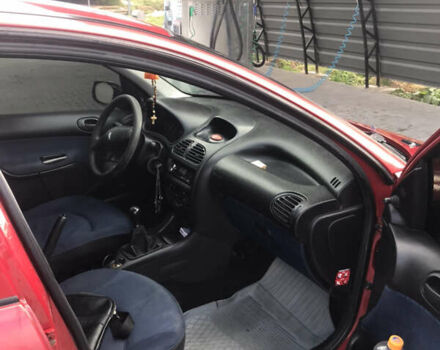 Красный Пежо 206, объемом двигателя 1.4 л и пробегом 270 тыс. км за 3350 $, фото 9 на Automoto.ua