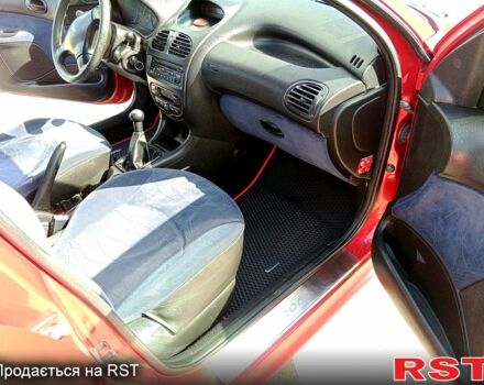 Червоний Пежо 206, об'ємом двигуна 1.4 л та пробігом 300 тис. км за 3700 $, фото 1 на Automoto.ua