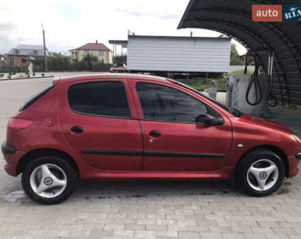 Красный Пежо 206, объемом двигателя 1.4 л и пробегом 270 тыс. км за 3350 $, фото 3 на Automoto.ua