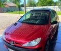 Красный Пежо 206, объемом двигателя 1.1 л и пробегом 206 тыс. км за 3100 $, фото 1 на Automoto.ua