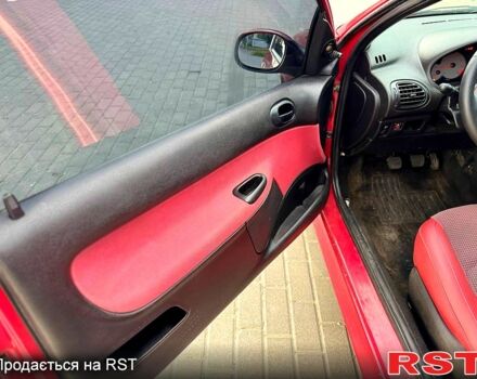 Червоний Пежо 206, об'ємом двигуна 1.1 л та пробігом 125 тис. км за 3500 $, фото 5 на Automoto.ua