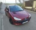 Красный Пежо 206, объемом двигателя 1.1 л и пробегом 200 тыс. км за 1550 $, фото 1 на Automoto.ua