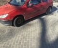 Красный Пежо 206, объемом двигателя 1.4 л и пробегом 300 тыс. км за 1200 $, фото 1 на Automoto.ua