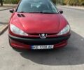 Красный Пежо 206, объемом двигателя 1.4 л и пробегом 195 тыс. км за 3700 $, фото 1 на Automoto.ua