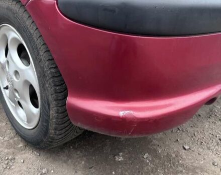 Червоний Пежо 206, об'ємом двигуна 1.12 л та пробігом 161 тис. км за 2200 $, фото 14 на Automoto.ua