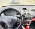 Красный Пежо 206, объемом двигателя 1.4 л и пробегом 195 тыс. км за 3700 $, фото 10 на Automoto.ua
