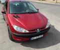 Красный Пежо 206, объемом двигателя 1.4 л и пробегом 195 тыс. км за 3700 $, фото 1 на Automoto.ua