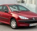 Красный Пежо 206, объемом двигателя 1.4 л и пробегом 233 тыс. км за 2200 $, фото 1 на Automoto.ua