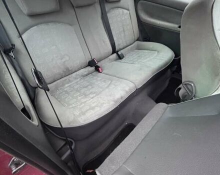 Червоний Пежо 206, об'ємом двигуна 1.12 л та пробігом 161 тис. км за 2200 $, фото 7 на Automoto.ua