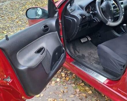 Красный Пежо 206, объемом двигателя 1.4 л и пробегом 199 тыс. км за 3900 $, фото 10 на Automoto.ua