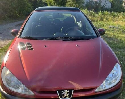 Красный Пежо 206, объемом двигателя 1.36 л и пробегом 280 тыс. км за 3200 $, фото 14 на Automoto.ua