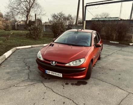 Красный Пежо 206, объемом двигателя 1.4 л и пробегом 241 тыс. км за 3200 $, фото 2 на Automoto.ua