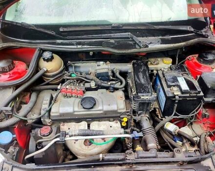 Красный Пежо 206, объемом двигателя 1.4 л и пробегом 211 тыс. км за 3000 $, фото 6 на Automoto.ua