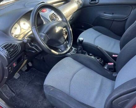 Красный Пежо 206, объемом двигателя 1.36 л и пробегом 280 тыс. км за 3200 $, фото 9 на Automoto.ua