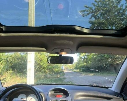 Красный Пежо 206, объемом двигателя 1.36 л и пробегом 280 тыс. км за 3200 $, фото 6 на Automoto.ua