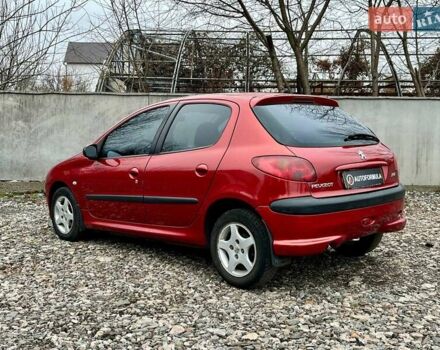 Красный Пежо 206, объемом двигателя 1.36 л и пробегом 232 тыс. км за 2990 $, фото 4 на Automoto.ua