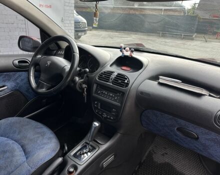 Красный Пежо 206, объемом двигателя 1.6 л и пробегом 195 тыс. км за 3750 $, фото 18 на Automoto.ua