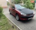 Красный Пежо 206, объемом двигателя 1.4 л и пробегом 221 тыс. км за 3300 $, фото 1 на Automoto.ua
