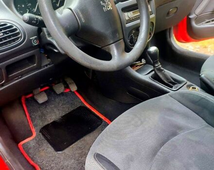 Червоний Пежо 206, об'ємом двигуна 1.4 л та пробігом 211 тис. км за 3000 $, фото 12 на Automoto.ua