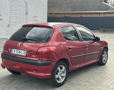Красный Пежо 206, объемом двигателя 1.6 л и пробегом 195 тыс. км за 3750 $, фото 7 на Automoto.ua