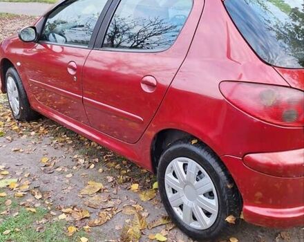 Красный Пежо 206, объемом двигателя 1.4 л и пробегом 199 тыс. км за 3900 $, фото 4 на Automoto.ua