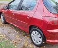 Красный Пежо 206, объемом двигателя 1.4 л и пробегом 199 тыс. км за 3900 $, фото 4 на Automoto.ua