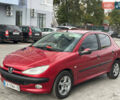 Червоний Пежо 206, об'ємом двигуна 1.59 л та пробігом 195 тис. км за 3800 $, фото 10 на Automoto.ua