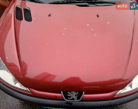 Красный Пежо 206, объемом двигателя 1.4 л и пробегом 231 тыс. км за 3400 $, фото 4 на Automoto.ua