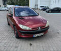 Красный Пежо 206, объемом двигателя 1.4 л и пробегом 180 тыс. км за 3350 $, фото 5 на Automoto.ua
