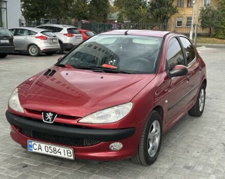 Красный Пежо 206, объемом двигателя 1.6 л и пробегом 195 тыс. км за 3750 $, фото 13 на Automoto.ua