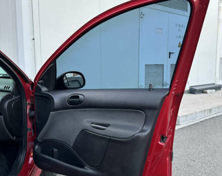 Красный Пежо 206, объемом двигателя 1.4 л и пробегом 263 тыс. км за 2600 $, фото 21 на Automoto.ua